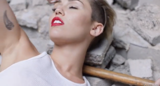 Illustration for article titled A Guide to Understanding Miley Cyrus's New 'Wrecking Ball' Video